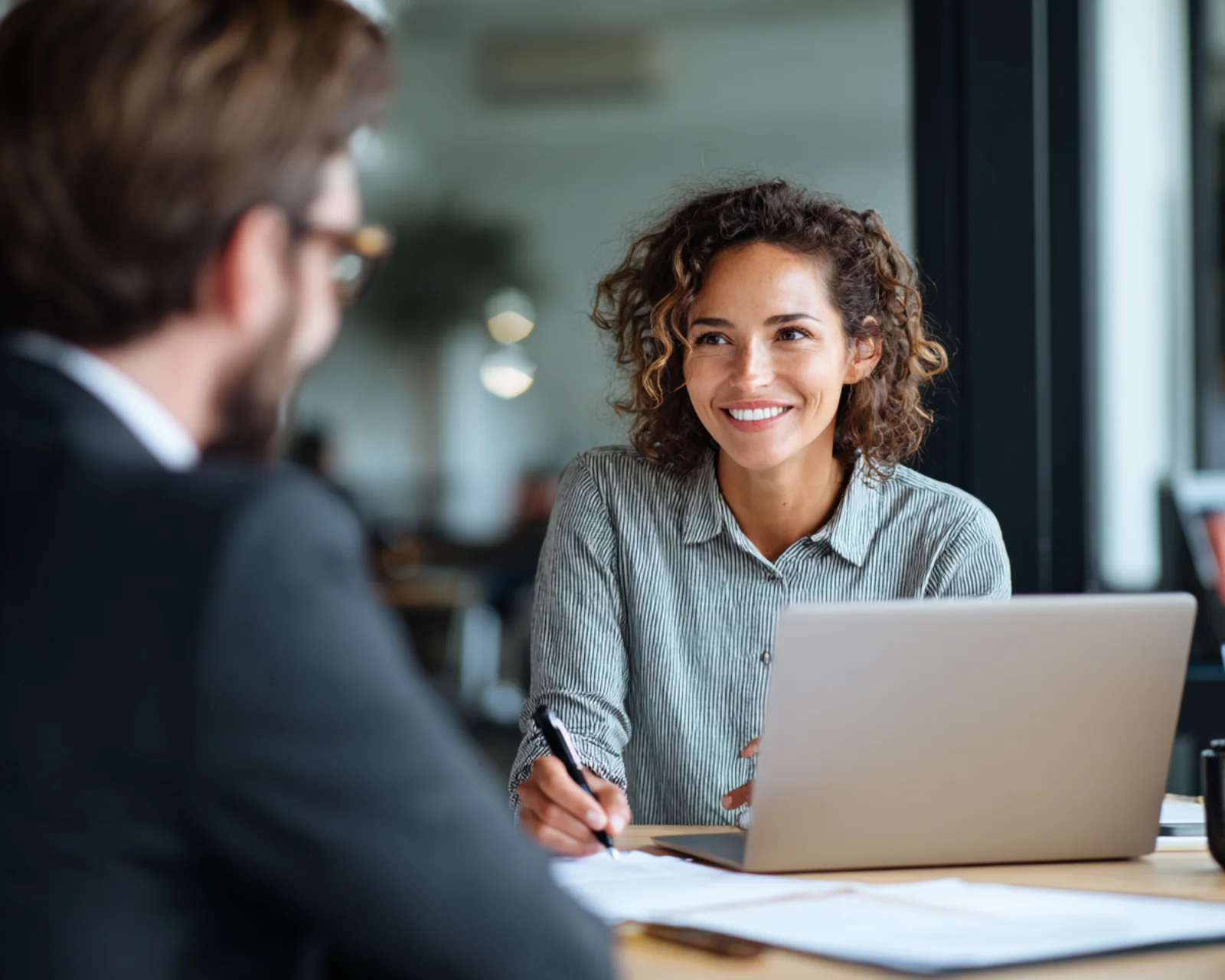 Diverse team of qualified accountants preparing VAT returns with professional expertise and attention to detail